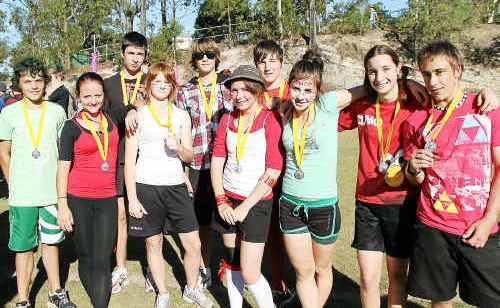 James Nash age champions from the school’s athletics carnival are (left to right) Josh Horbal, Aimee Bruckner, Liam O’Brien, Christina Aberley, Brad Payne, Katie Williams, Drew Wenzel, Jessica Hurrell, Josie Whordley and Josh Clark. Students braved a hot day to triumph. James Nash age champions from the school’s athletics carnival are (left to right) Josh Horbal, Aimee Bruckner, Liam O’Brien, Christina Aberley, Brad Payne, Katie Williams, Drew Wenzel, Jessica Hurrell, Josie Whordley and Josh Clark. Students braved a hot day to triumph.